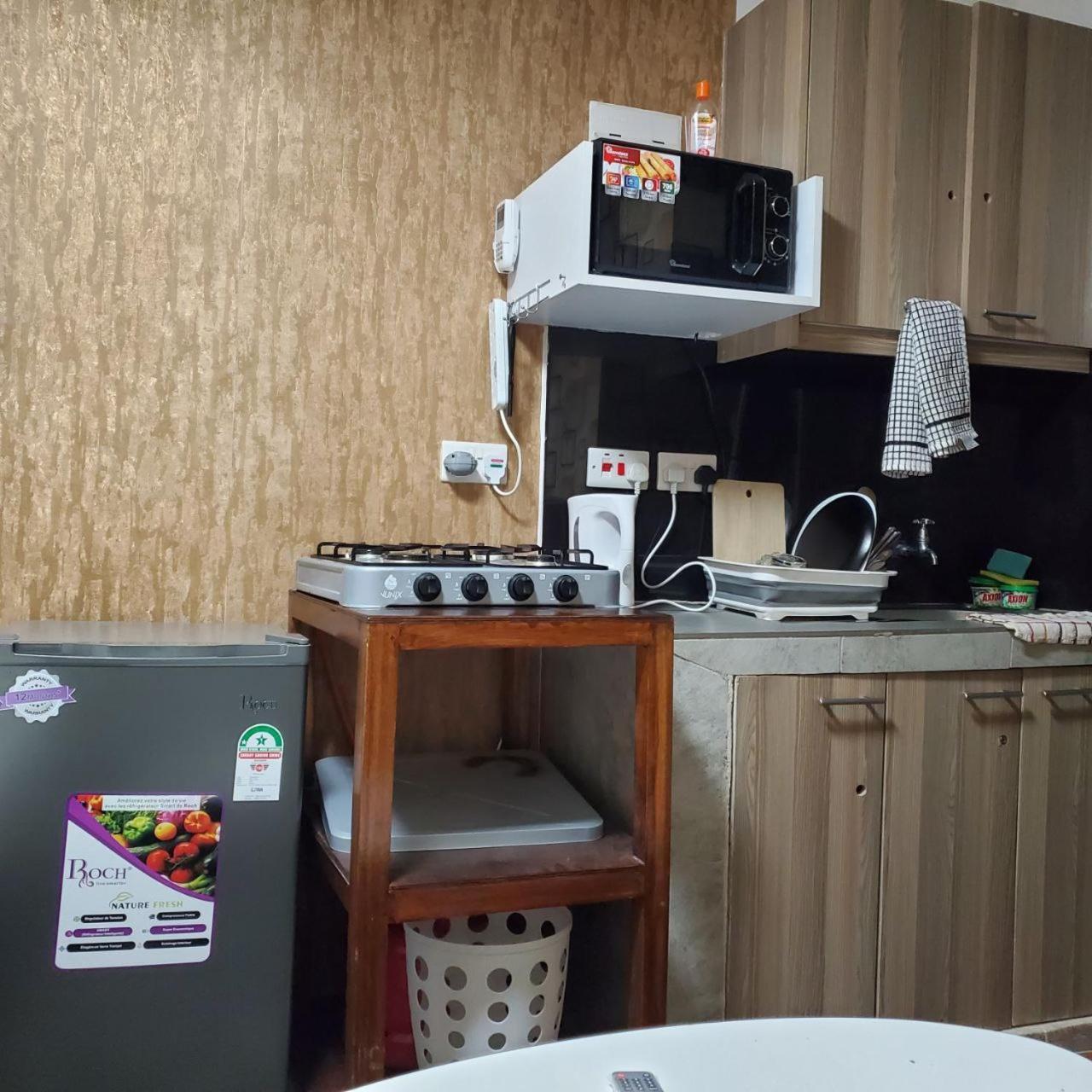 ナイロビLovely & Cozy Compact Studio Near Airport With Rooftop Viewアパートメント エクステリア 写真